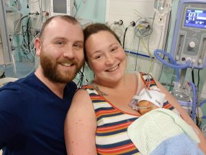 mum, dad and premature baby in hospital